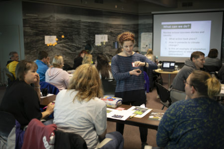 Program Manager, Becky Bronstein answers a teacher's question during a climate science training.